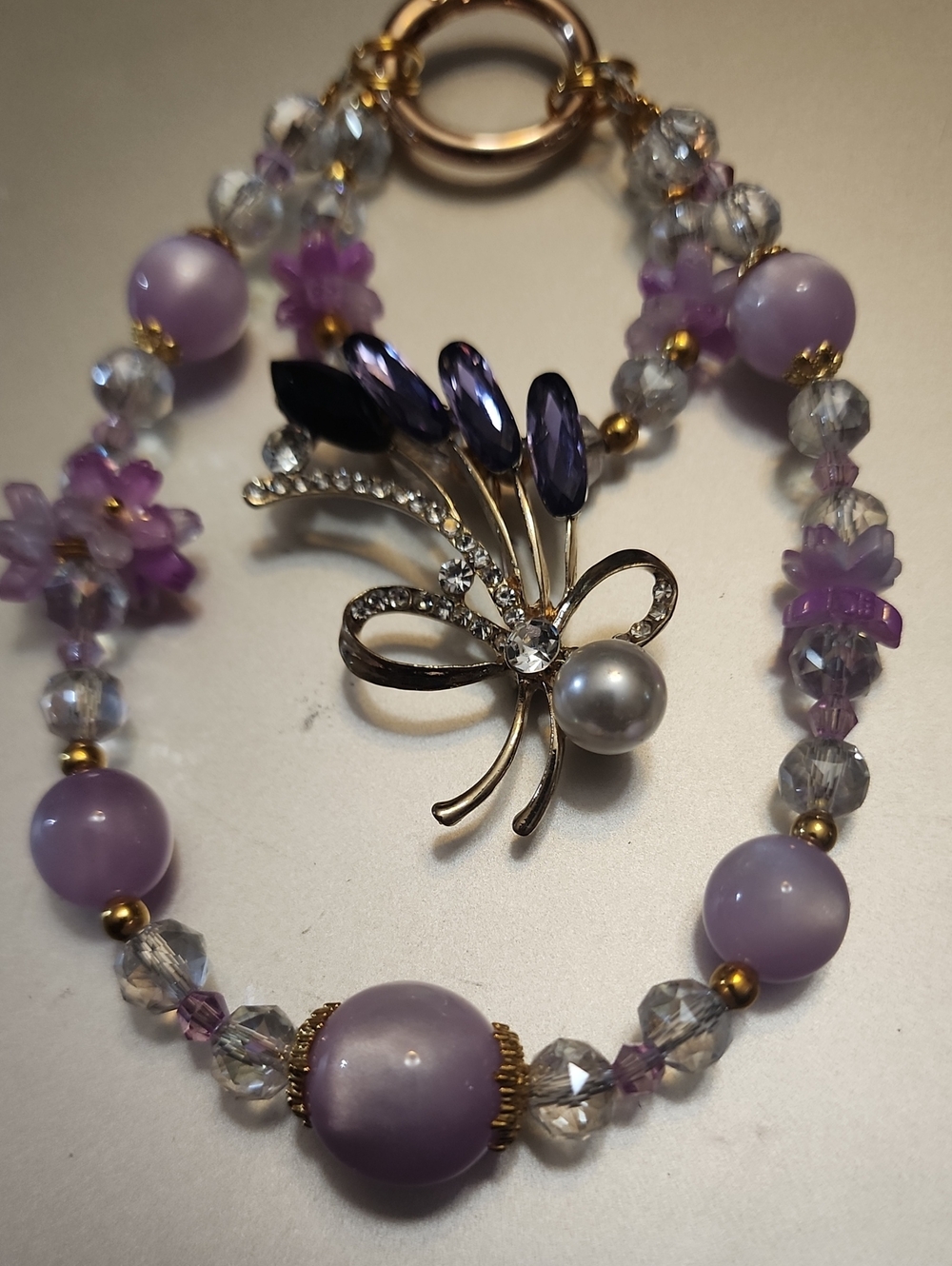 Purple Beaded Phone Charm with Crystal Flower Brooch